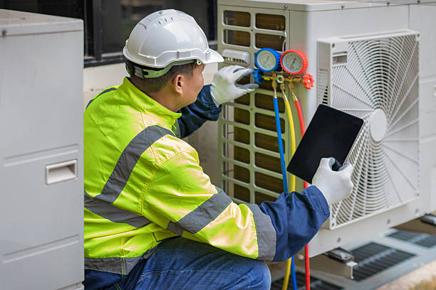 Professional Heat Pump Repair technician working in Salem, IL